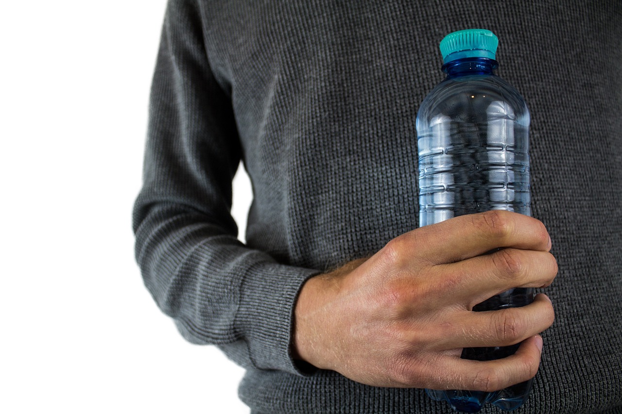 bottled water hand
